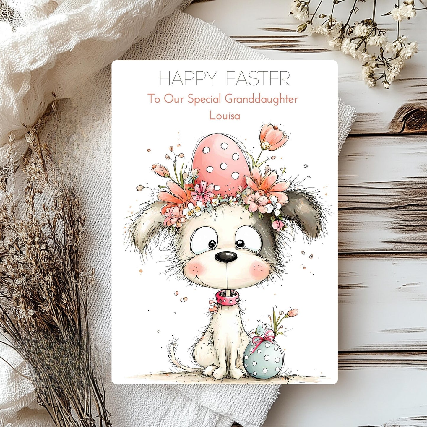 Easter card with a dog illustration and decorative eggs on a wooden surface.