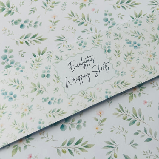 Eucalyptus wrapping sheets with a floral pattern on a white background