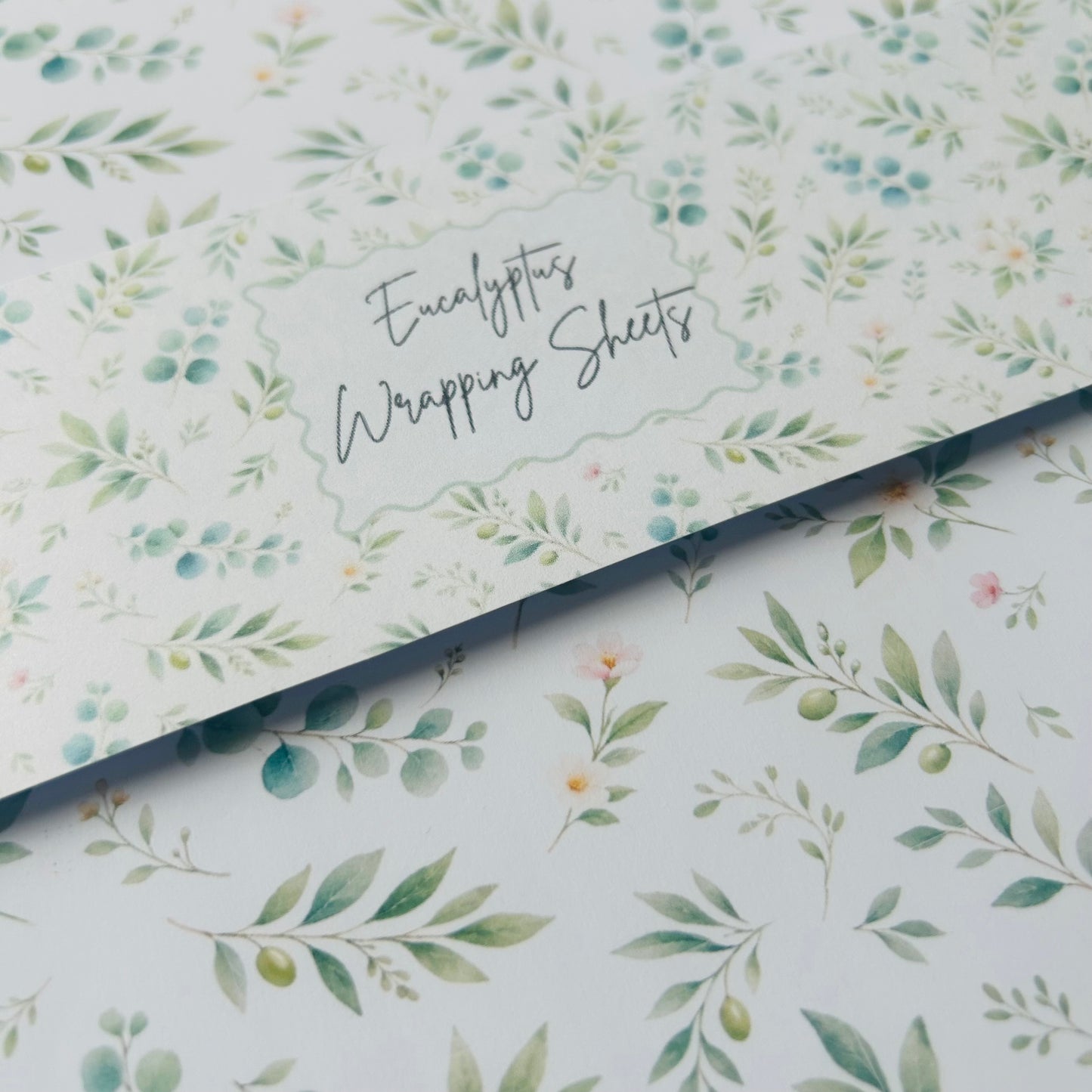 Floral patterned wrapping sheets with 'Eucalyptus Wrapping Sheets' text.