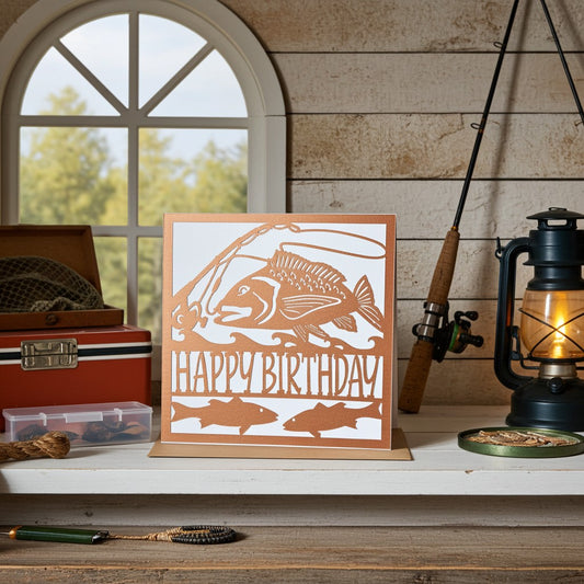 Unique fishing card on a shelf with a window behind and fishing equipment.