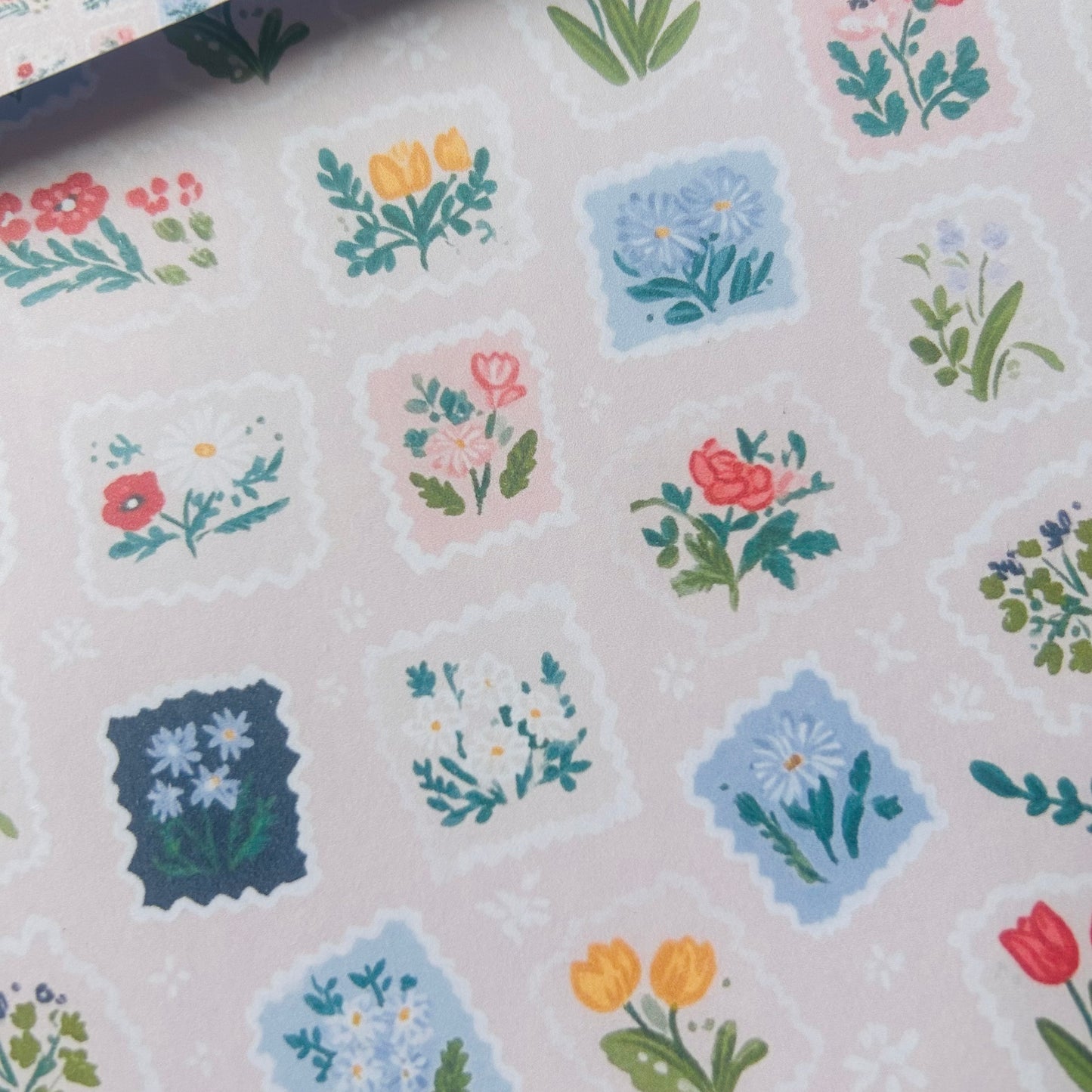 Pattern of floral A4 gift wrap on a white background