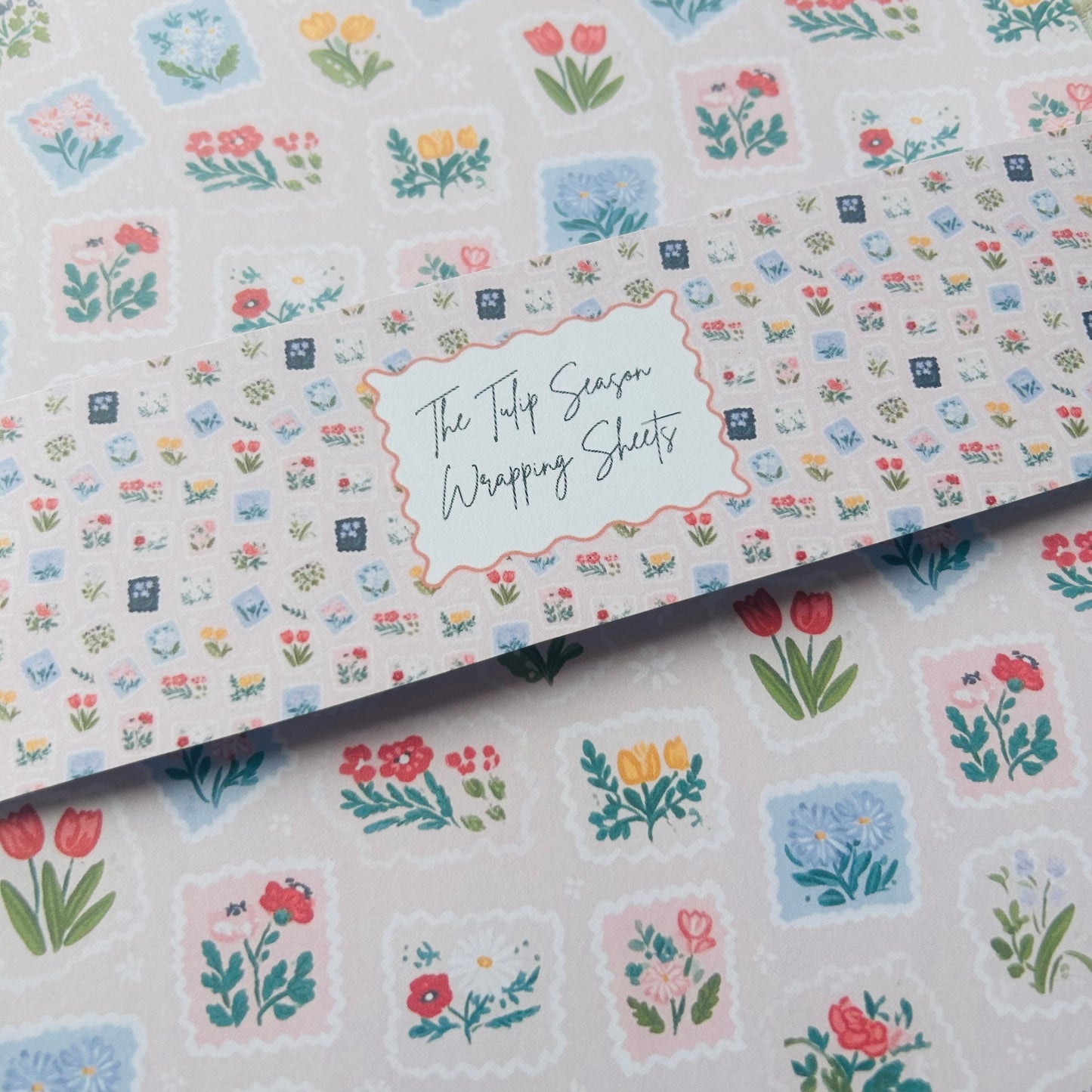 Floral patterned wrapping sheets with 'The Tulip Season' text.