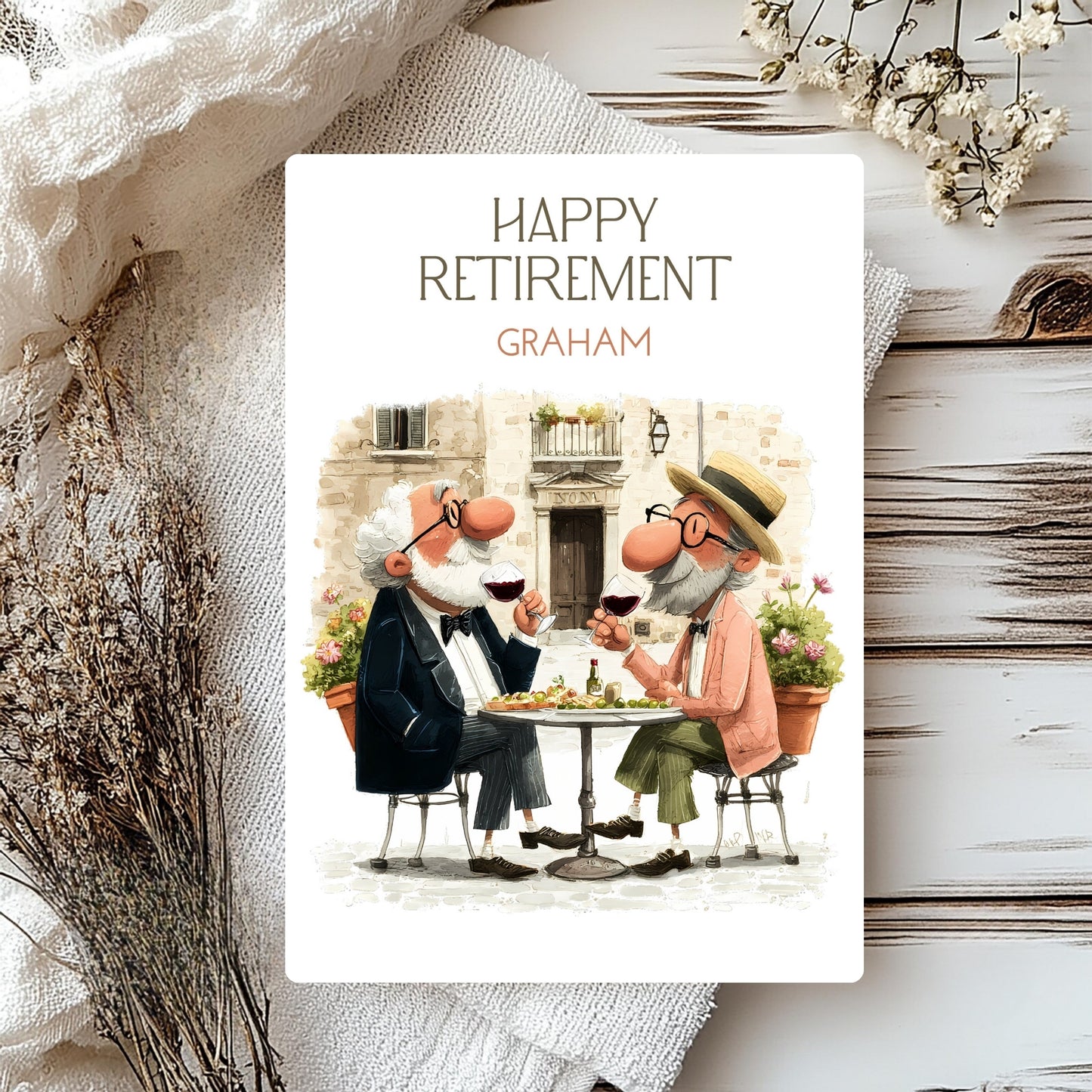 Happy Retirement card with two elderly men sitting at a table, surrounded by decorative elements.