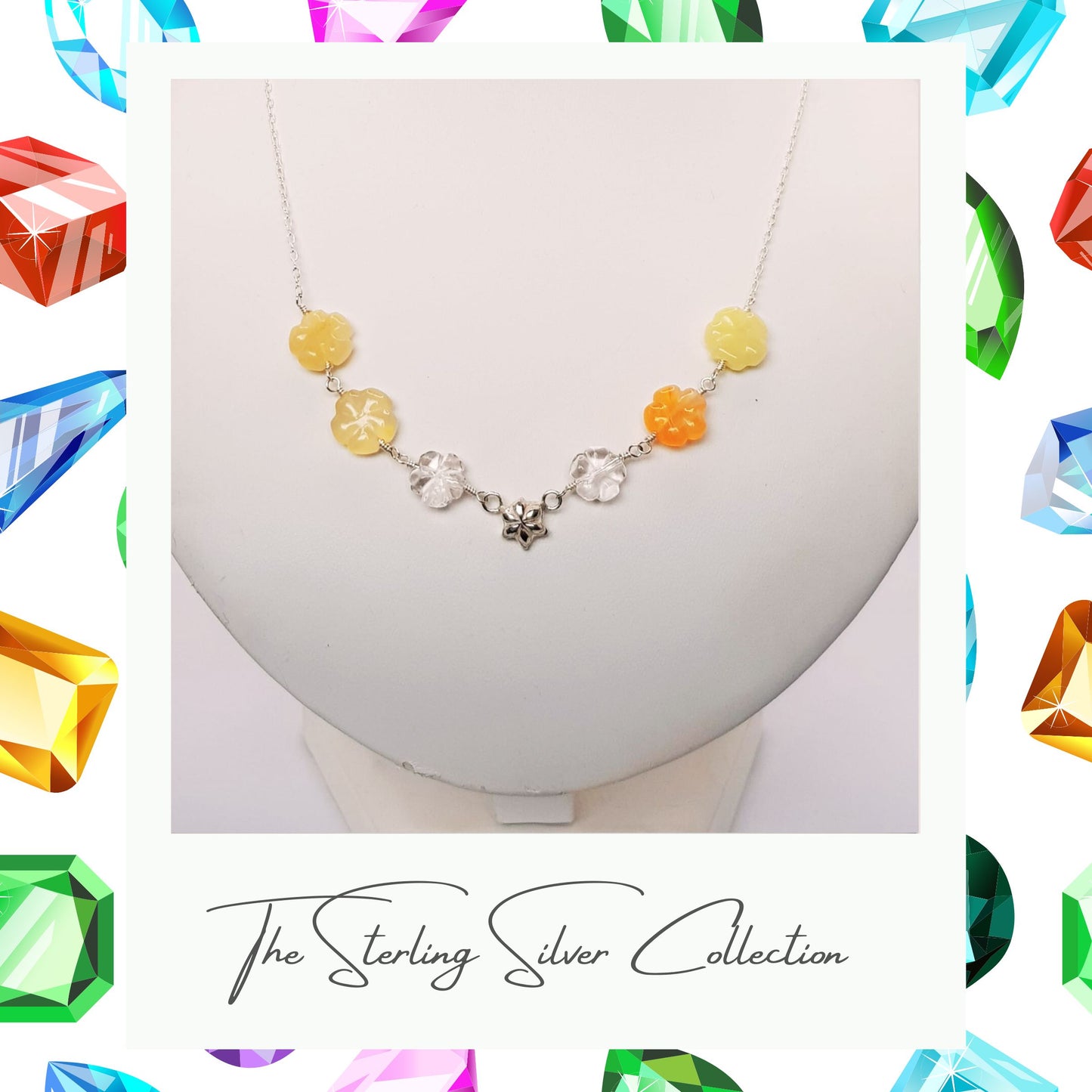Single gemstone necklace in orange and lemon tones on a necklace stand.