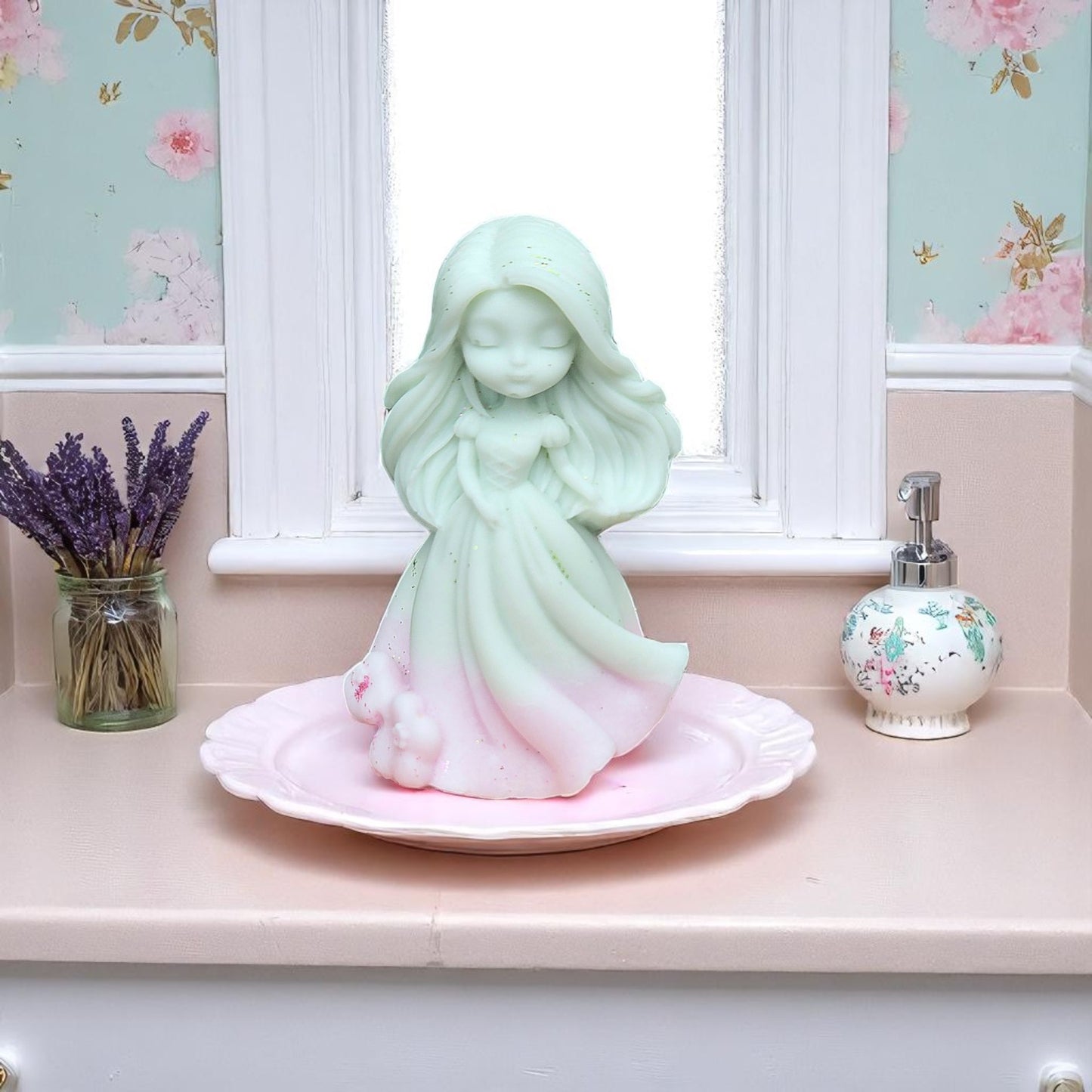 Decorative wax melt on a plate with floral wallpaper in the background