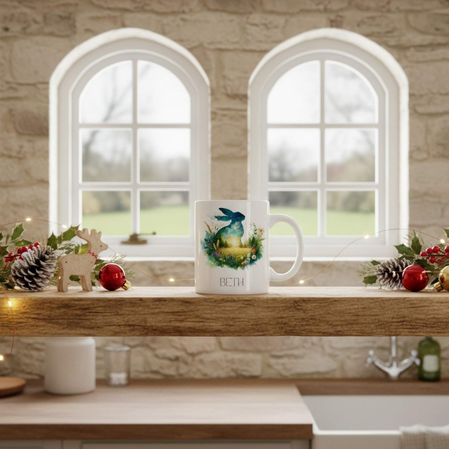 Decorative mug with a hare design on a kitchen counter with festive decorations.