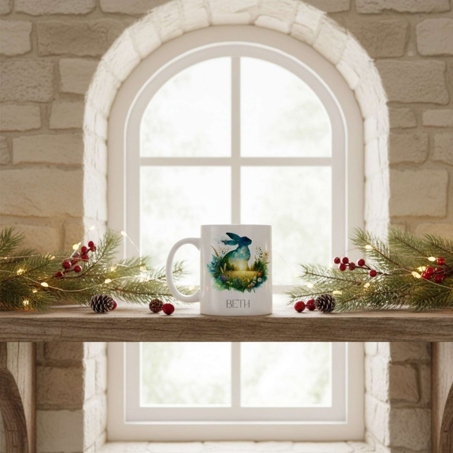 Mug with a hare design on a windowsill decorated with greenery and berries.