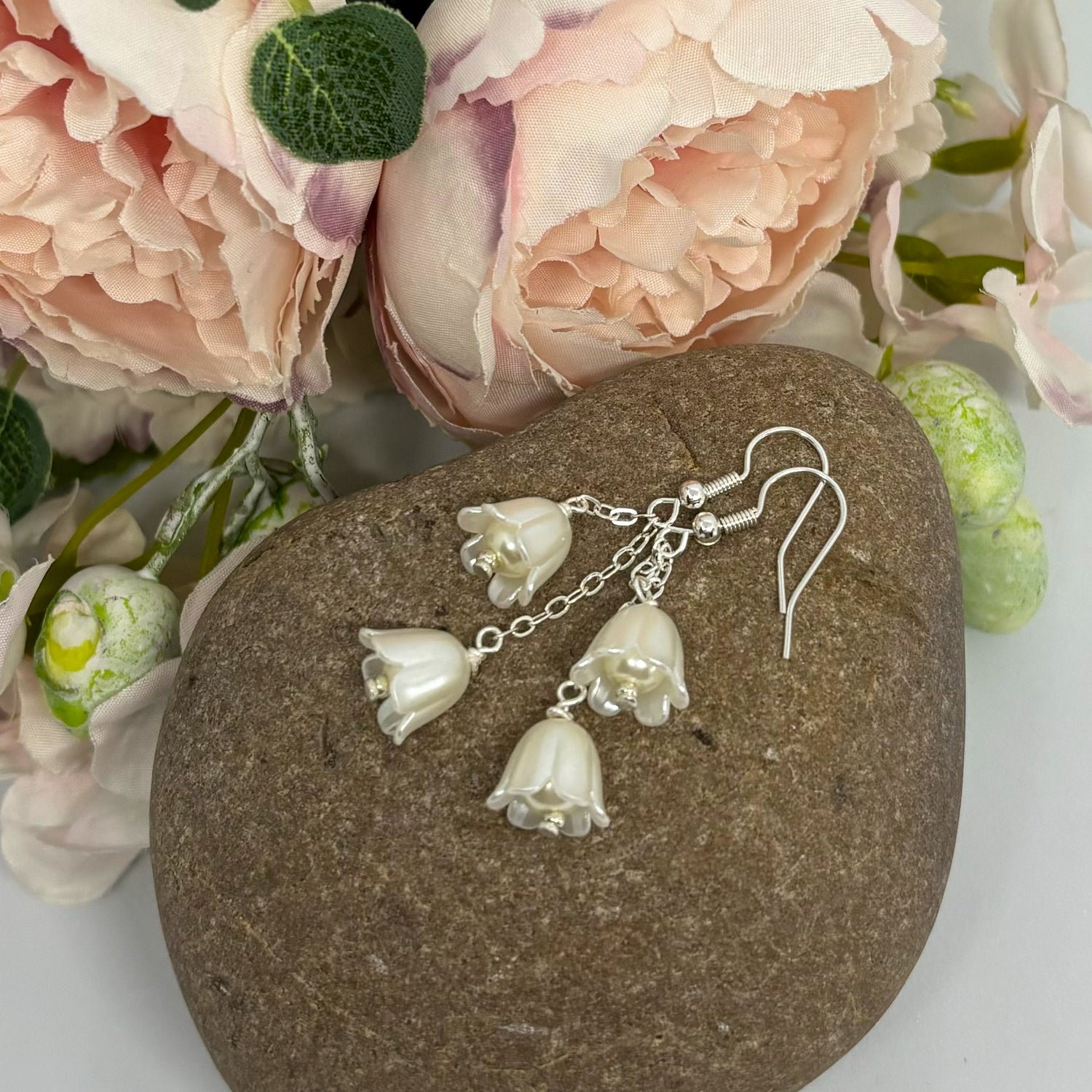 Ivory tulip earrings with silver hooks
