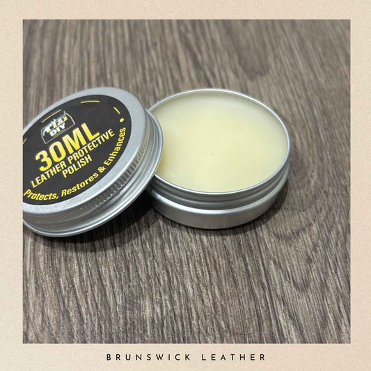 30ML leather polish container on a wooden surface with 'Brunswick Leather' branding.