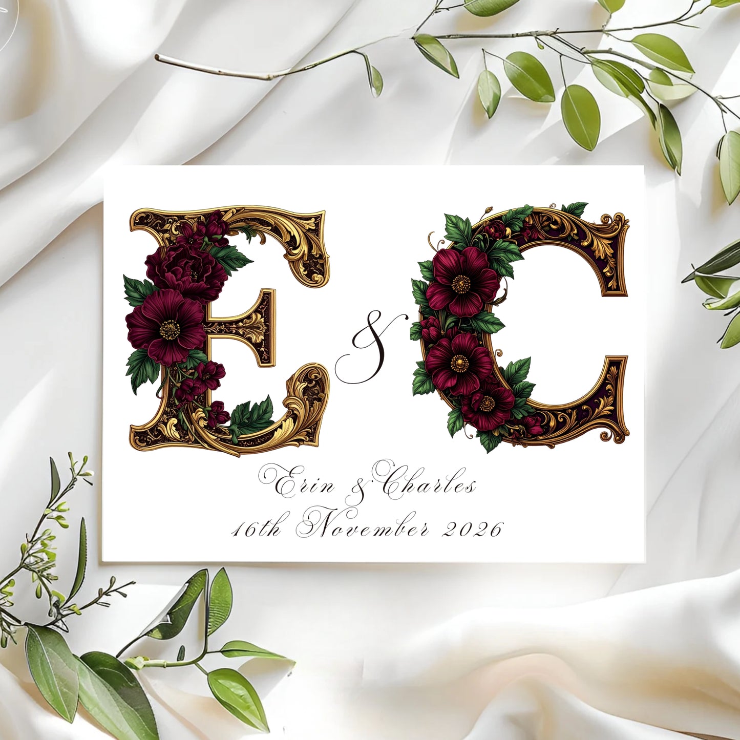 Decorative wedding card with medieval floral 'EO' initials on a white background with green leaves.