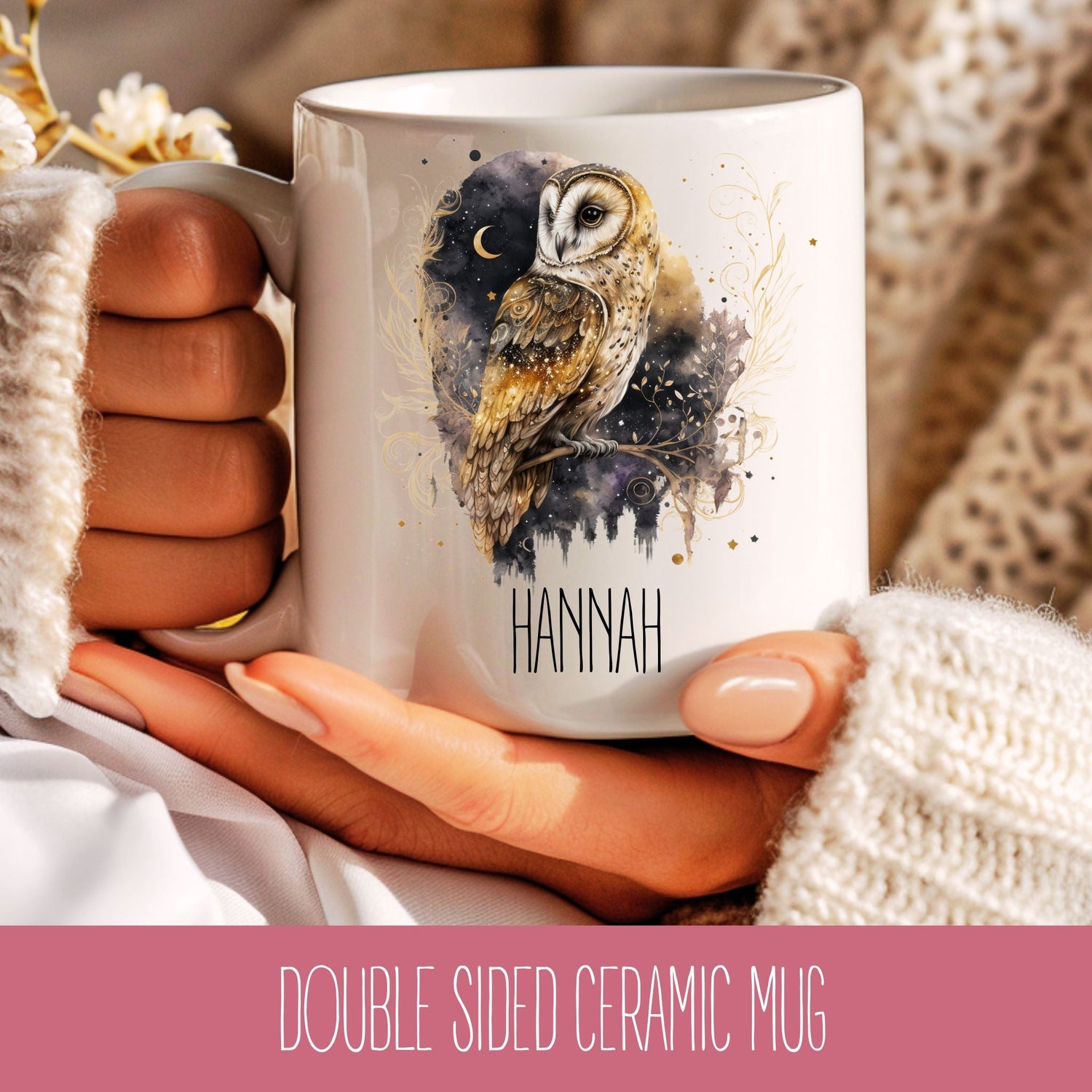 A ceramic coffee mug with an owl design and a personalised name 'Hannah' on the side, held in a person's hand.