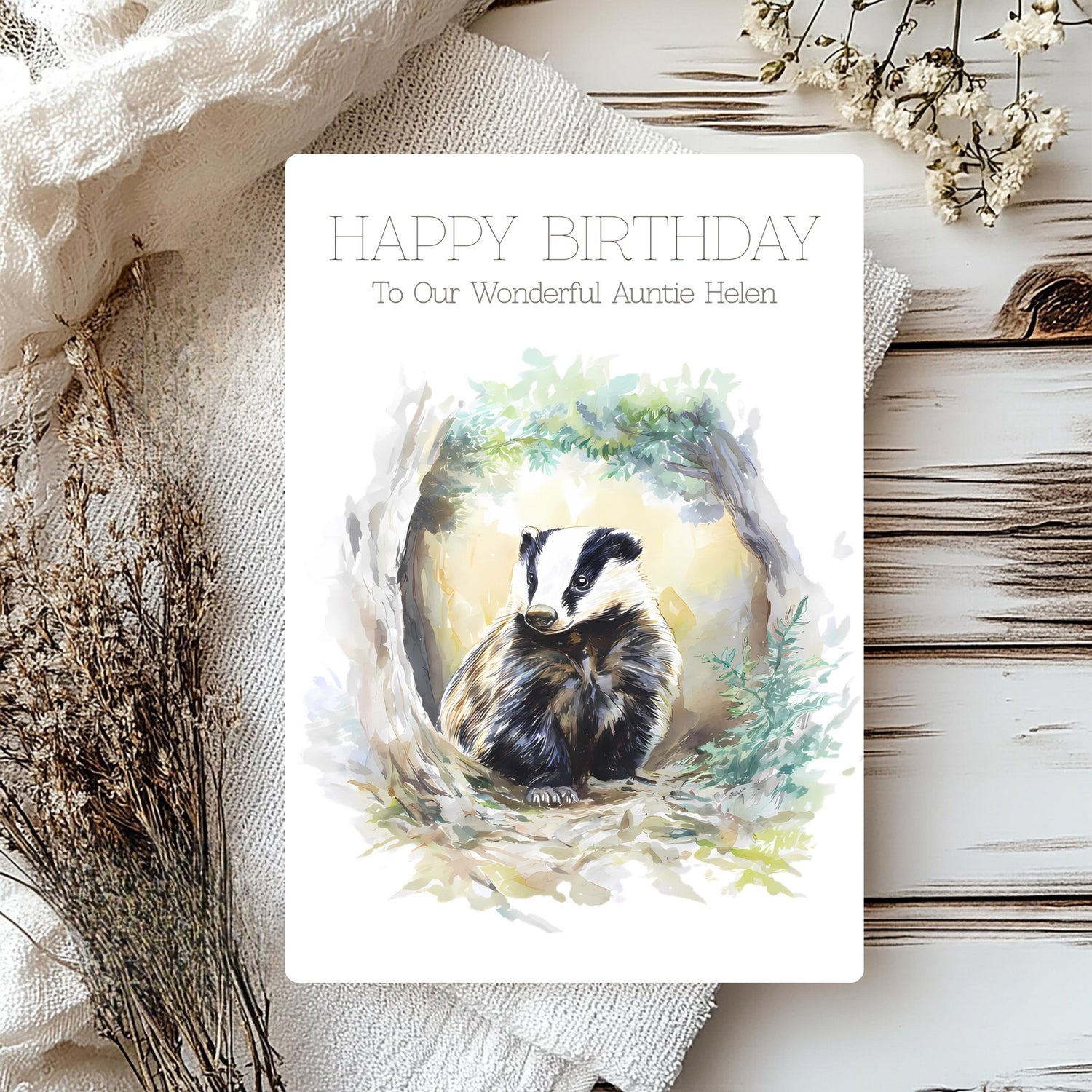 Birthday card with badger illustration on a rustic background