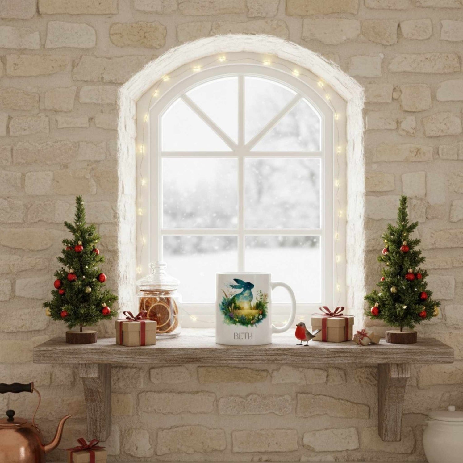 Decorative Christmas setup with a hare mug, small trees, and lights on a stone mantel.