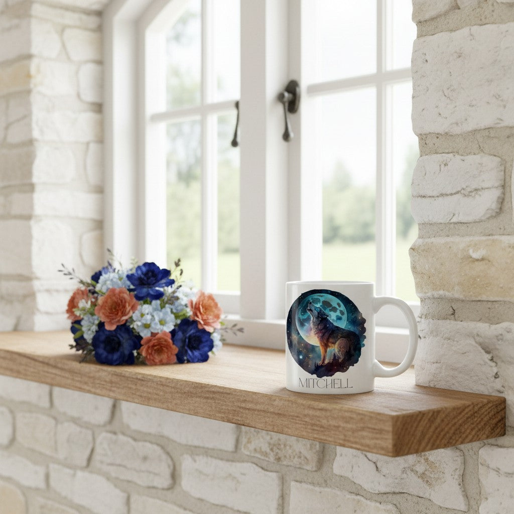 Mug with wolf design and flowers on a wooden shelf by a window.