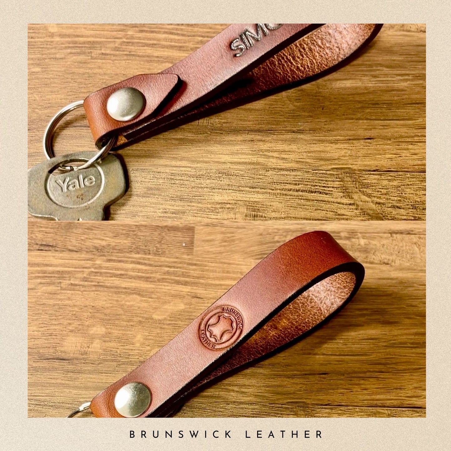 Brown leather keychain with metal tag on a wooden surface, branded 'Brunswick Leather'.