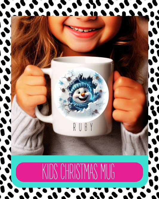 A child holding a personalised ceramic mug with a snowman design and the name 'Ruby' on it.