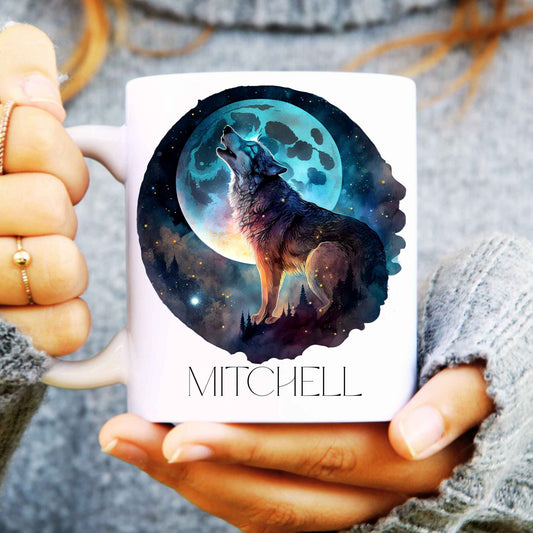 Mug with a wolf and moon design held by hands