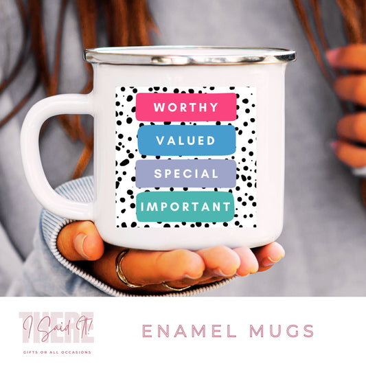A white ceramic enamel mug with a motivational message 'Worthy. Valued. Special. Important.' in different colors.