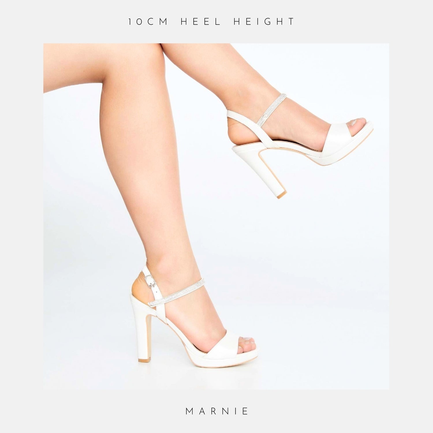 Ivory high-heeled sandals worn by a model on a light grey background, with 'MARNIE' branding.