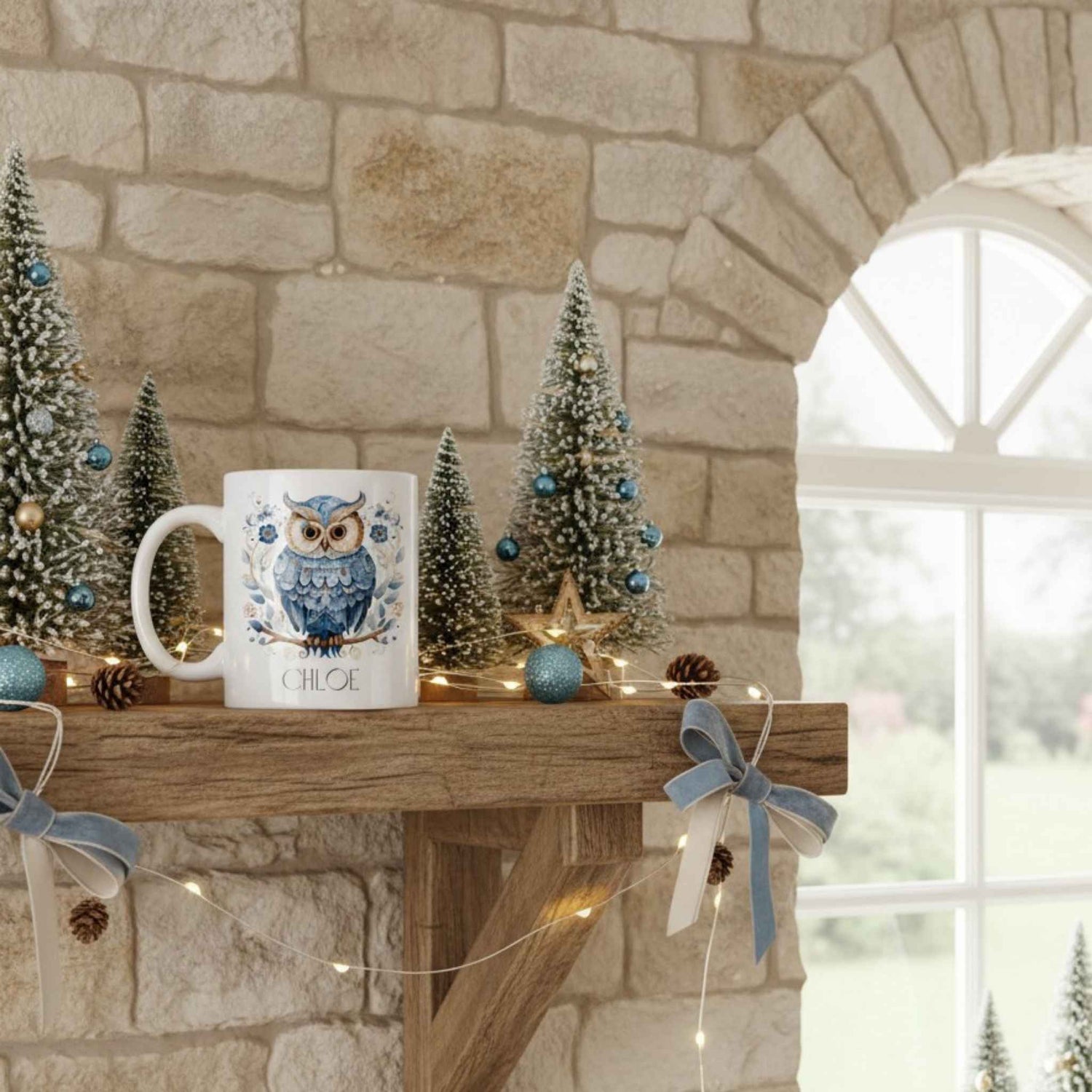 Decorative mantel with Christmas trees, mug featuring an owl design, and stone wall background