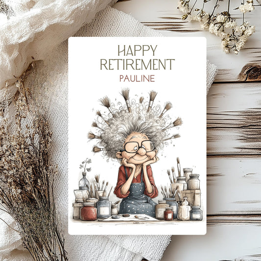 Happy Retirement card with illustration of a person with grey hair and glasses, surrounded by art supplies.