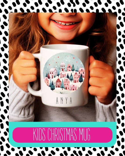 A child holding a white ceramic mug with a Christmas design, including a cityscape and the text 'Kids Christmas Mug'.