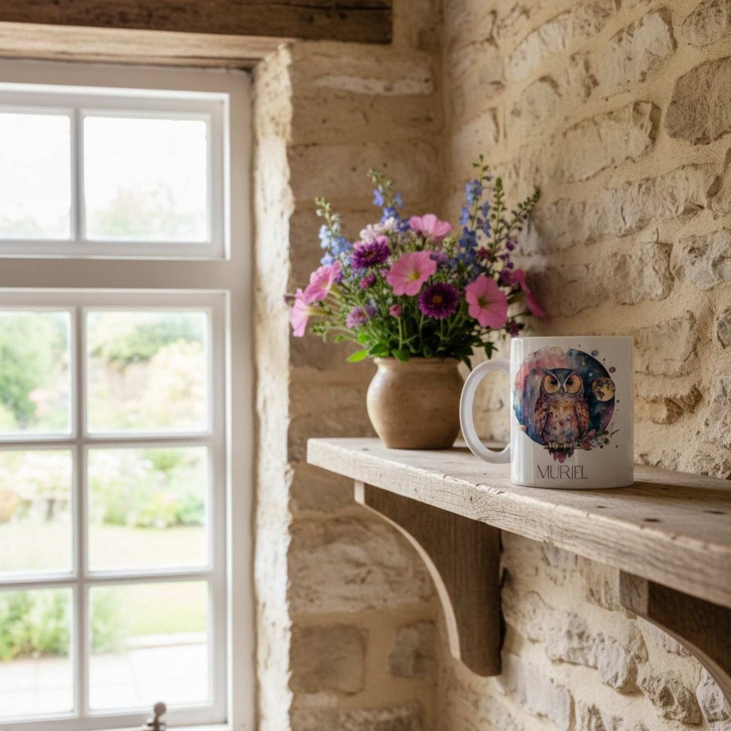 Floral arrangement and mug on a stone fireplace mantle