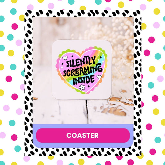 A colourful square coaster with a sarcastic message 'Silently Screaming Inside' written in a bold, decorative font, surrounded by a dotted pattern.