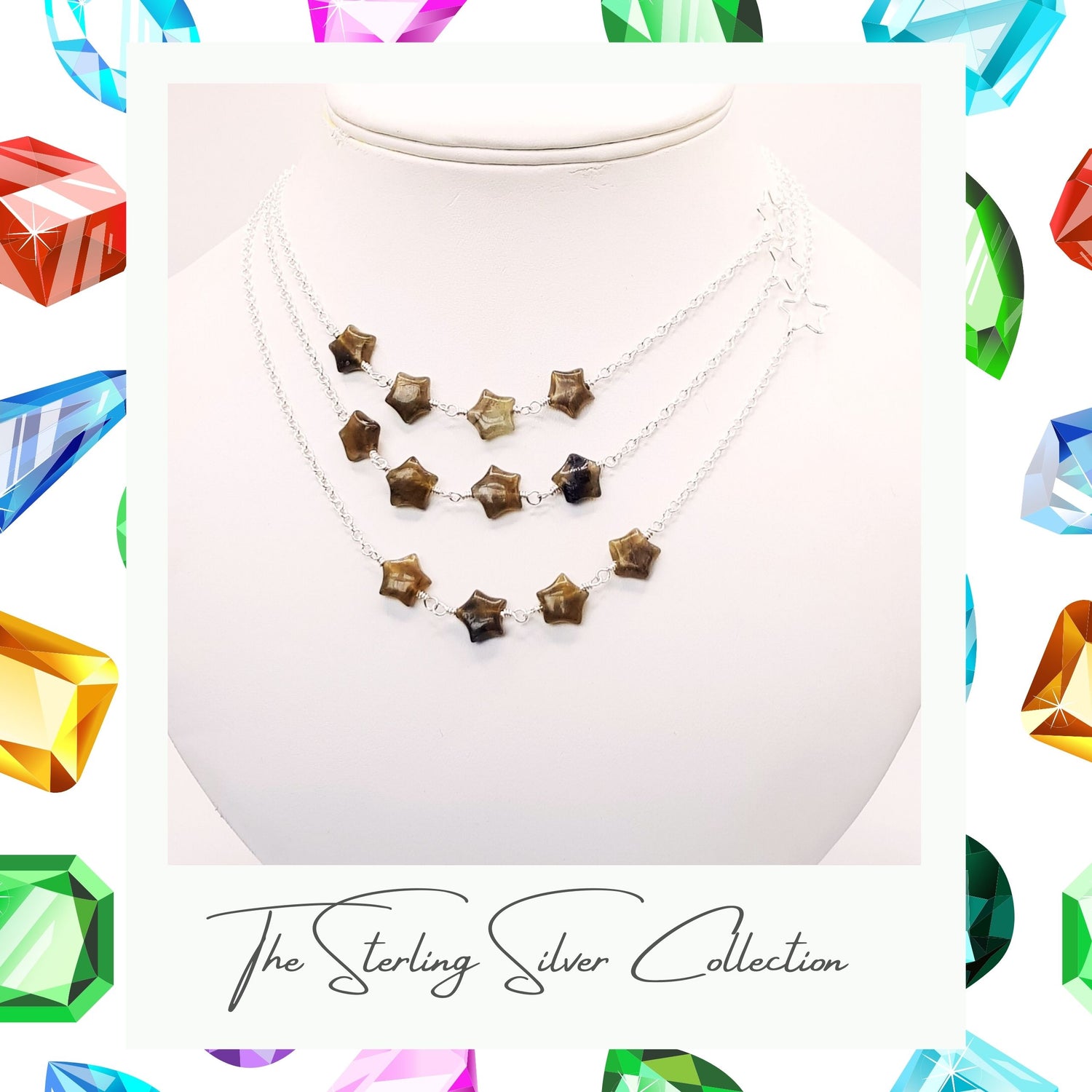 A sterling silver necklace with four labradorite shaped stars on a chain, presented against a mannequin jewelry display stand with additional colorful gemstones in the background.