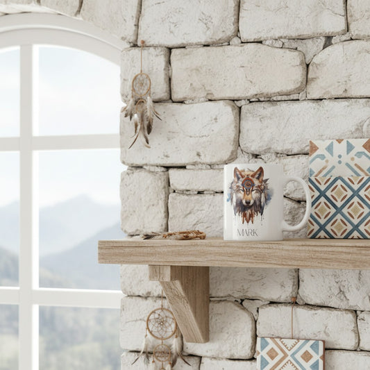 Mug with a wolf design on a wooden shelf against a stone wall with a window in the background.