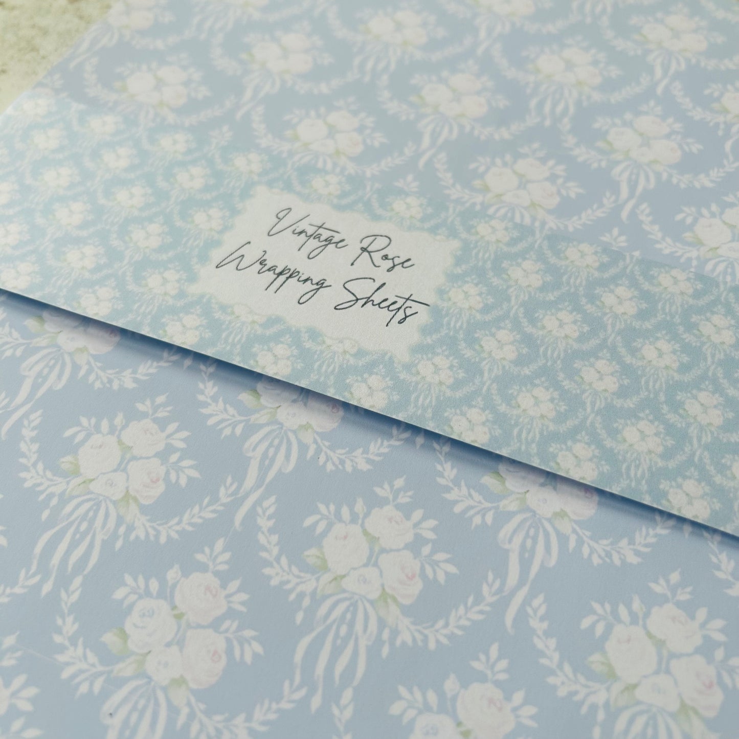 Floral patterned wrapping paper with a label on a matching background
