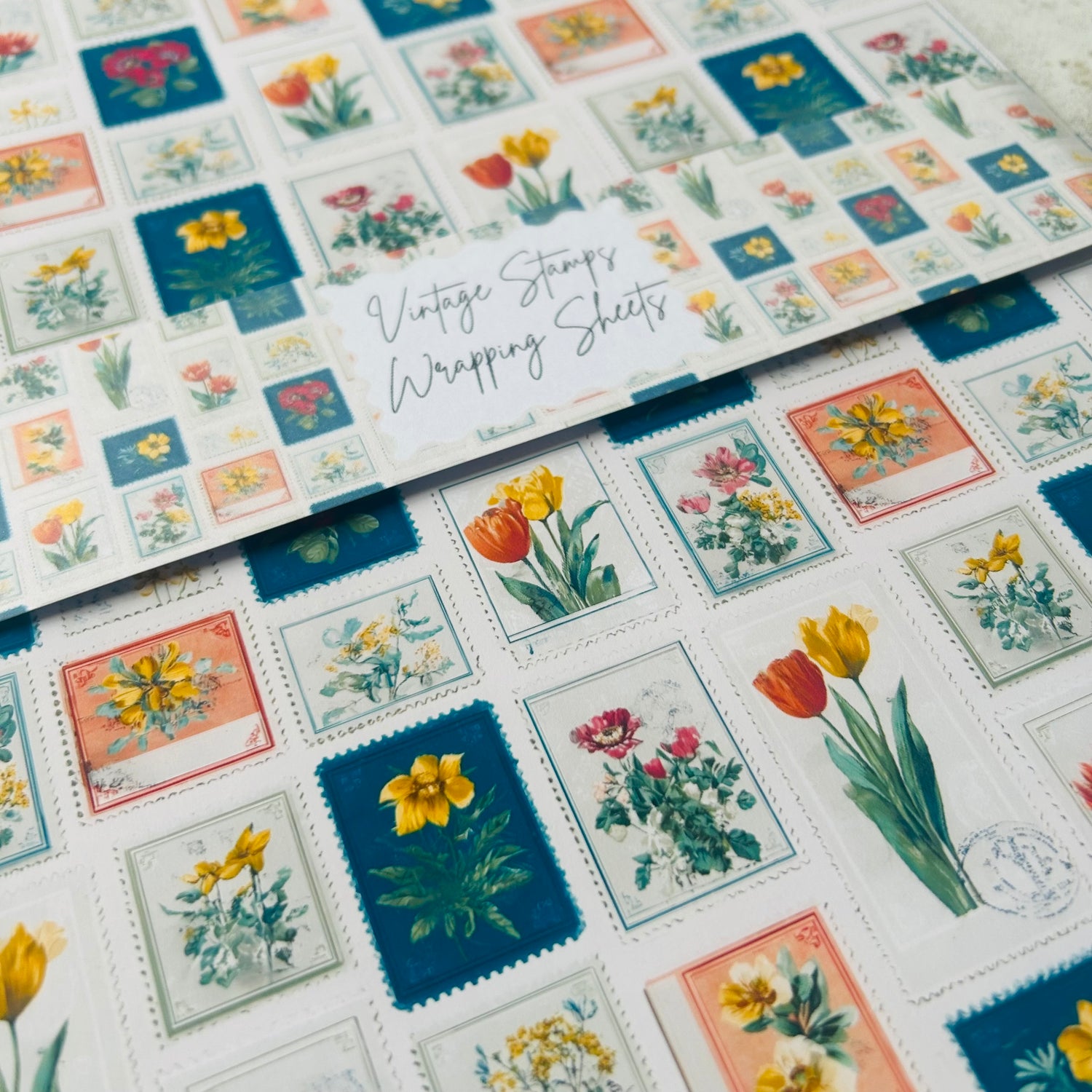 Vintage-style floral stamps on a wrapping sheet with 'Vintage Stamps' text.