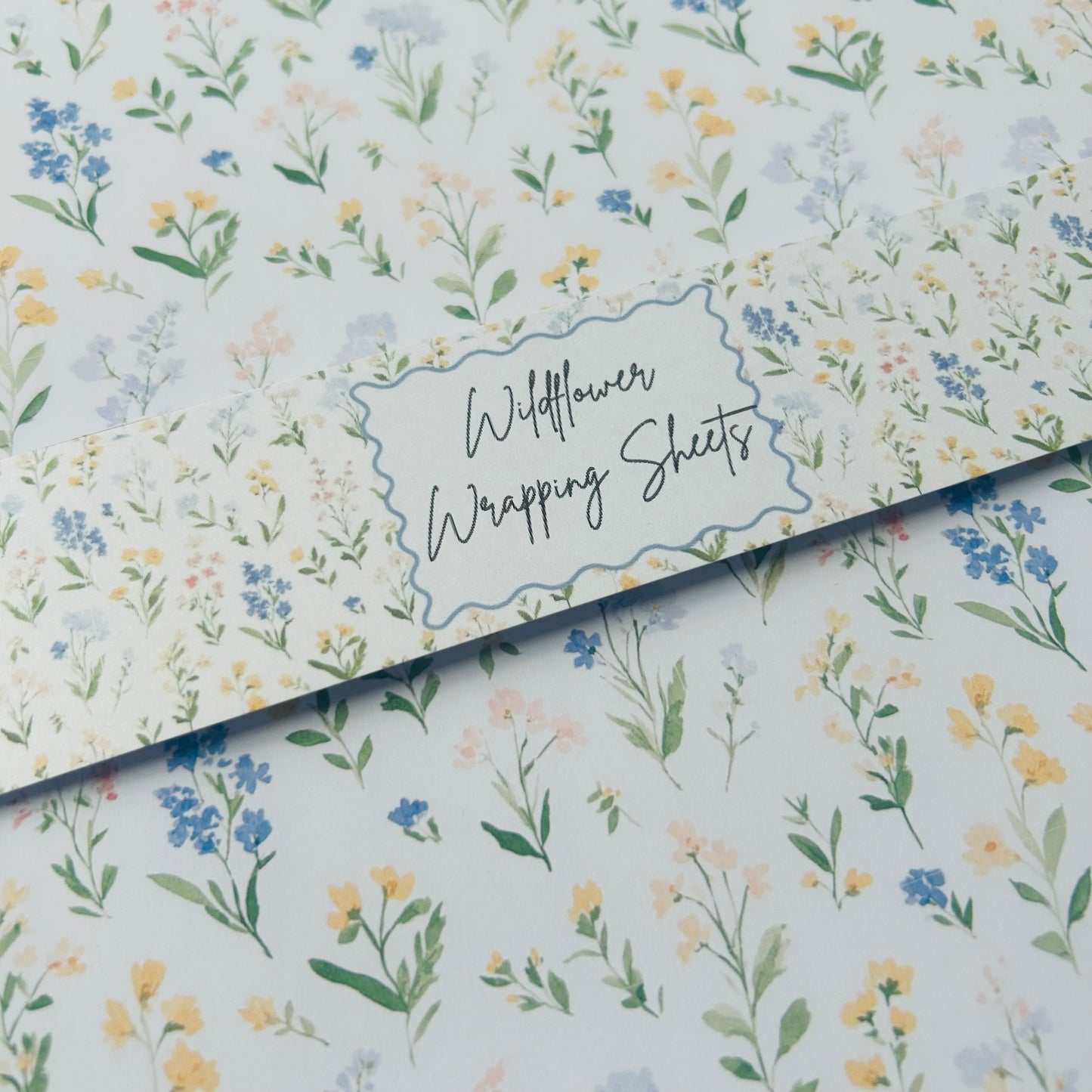 Wildflower wrapping sheets with a floral pattern on a white background