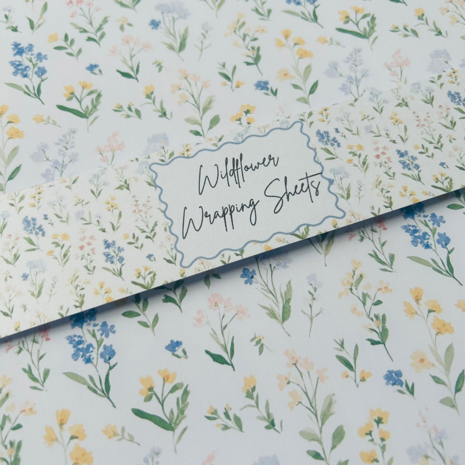 Wildflower wrapping sheets with a floral pattern on a white background