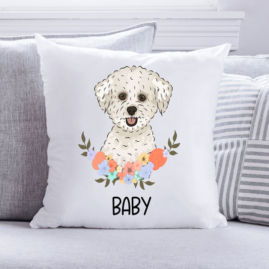 A square-shaped white cushion with a printed image of a Bichon Frise dog in the centre, surrounded by a floral pattern with the text 'BABY' at the bottom.