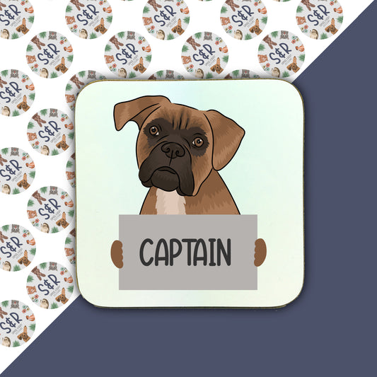 A square coaster with an illustration of a Boxer dog and the name 'Captain' below it.