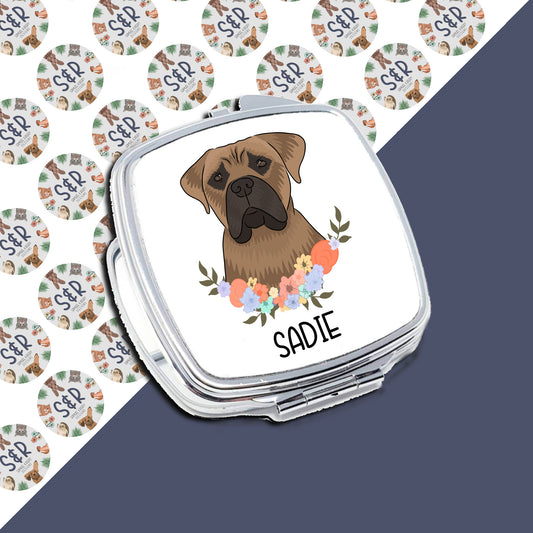 A personalised compact mirror with a sublimated design of a Bullmastiff dog and floral elements, with the name 'Sadie' printed on the front.
