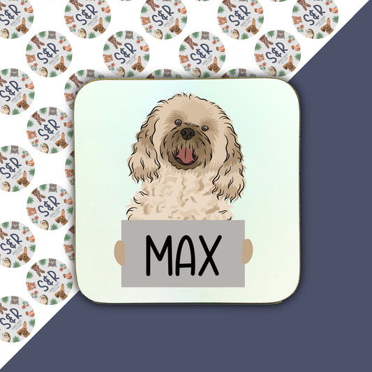 A personalised square coaster with an illustration of a cavachon dog at the top and the name 'Max' printed on the bottom.