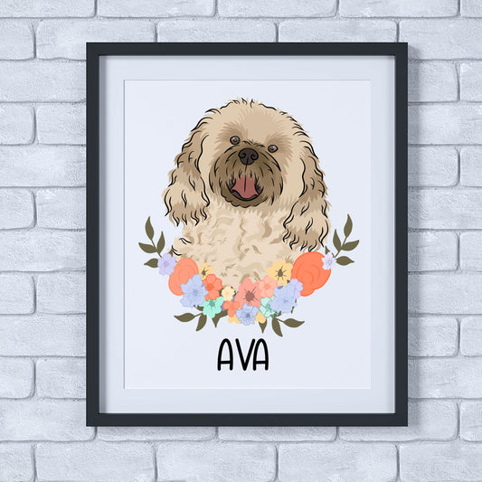 A personalised cavachon dog print with a floral border, framed in a black frame, with the name 'ava' at the bottom.