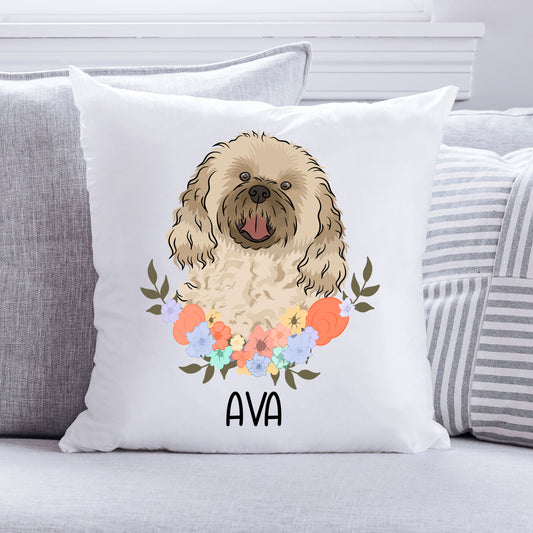 A personalised square cushion featuring an illustration of a cavachon dog with a floral pattern in the background.