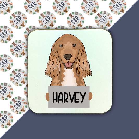 A square coaster with an illustration of a Cocker Spaniel dog holding a sign with the name 'Harvey'.