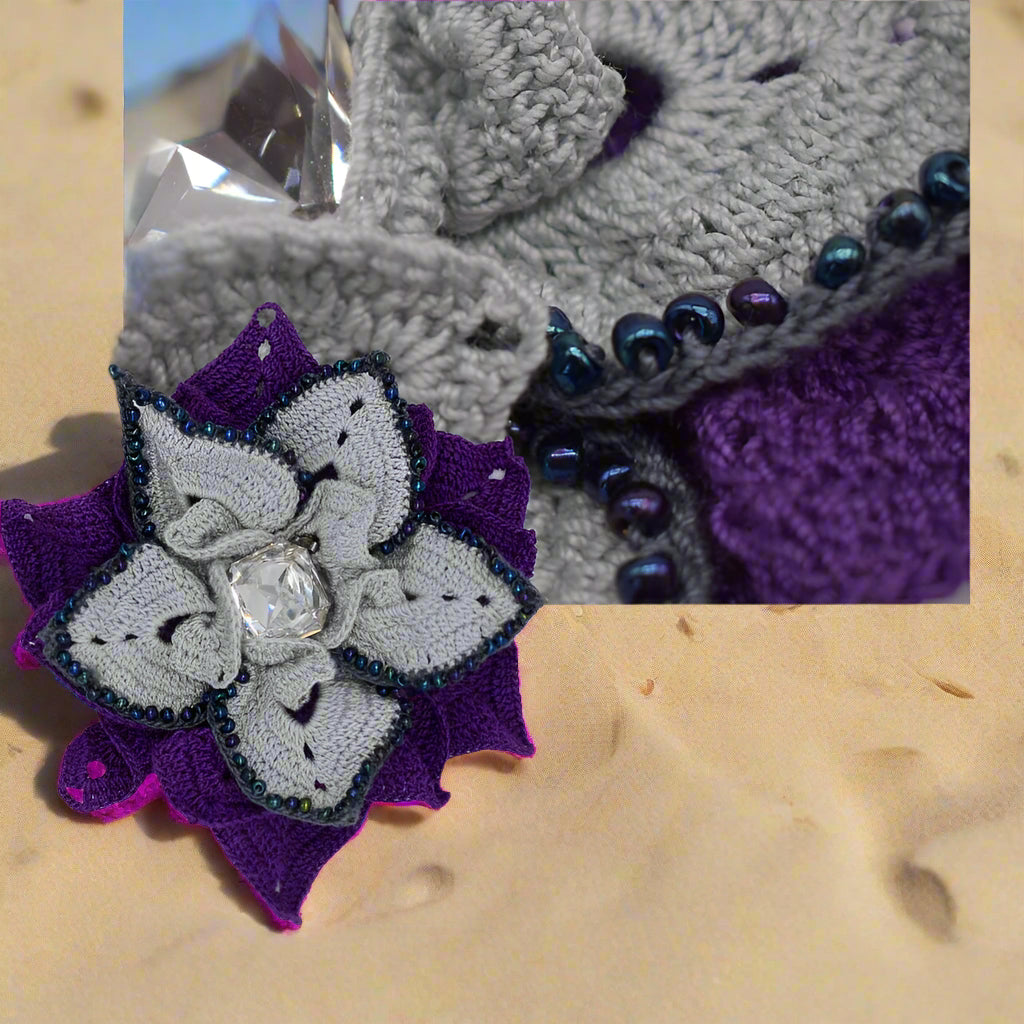 purple brooch