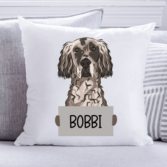 A personalised cushion with an illustration of an English Setter dog within a white square frame, with the name 'Bobbi' printed on the front.