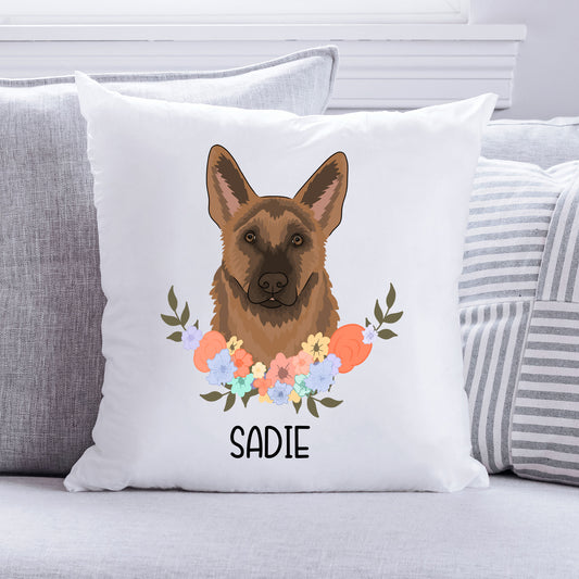 A square-shaped cushion with a white background featuring a printed image of a German Shepherd dog with a floral design around it.