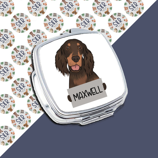 A personalised compact mirror with an image of a brown dog breed, presumably a Gordon Setter, with the name 'Maxwell' written on the front.