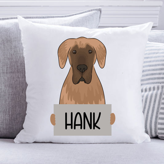 A square-shaped cushion with an illustration of a Great Dane dog in the centre, with the name 'Hank' printed on the front.