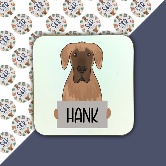 A square coaster with an illustration of a Great Dane dog at the top, with the name 'Hank' written at the bottom.