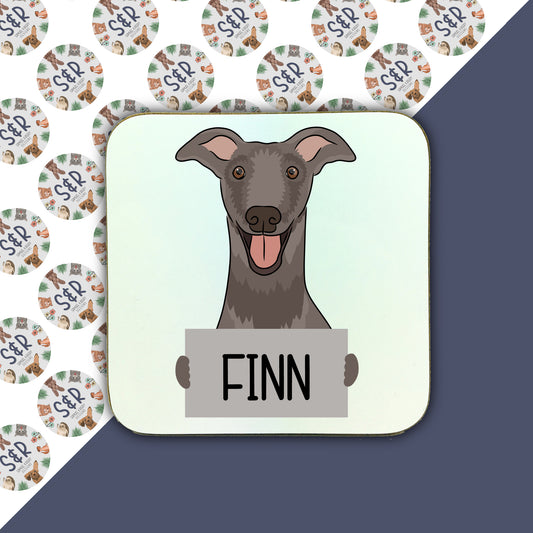 A square coaster with a cartoon illustration of a greyhound dog with a text label in the center that reads 'FINN'.