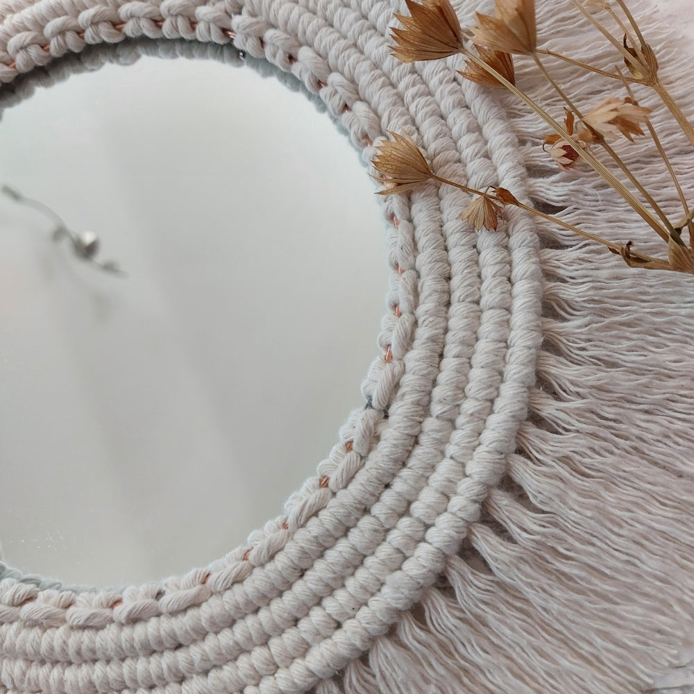 Close up detailing of a macrame mirror