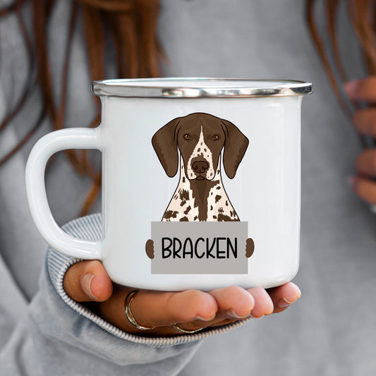 A white enamel mug with a printed image of a dog, likely a Pointer, with the text 'BRACKEN' next to it.